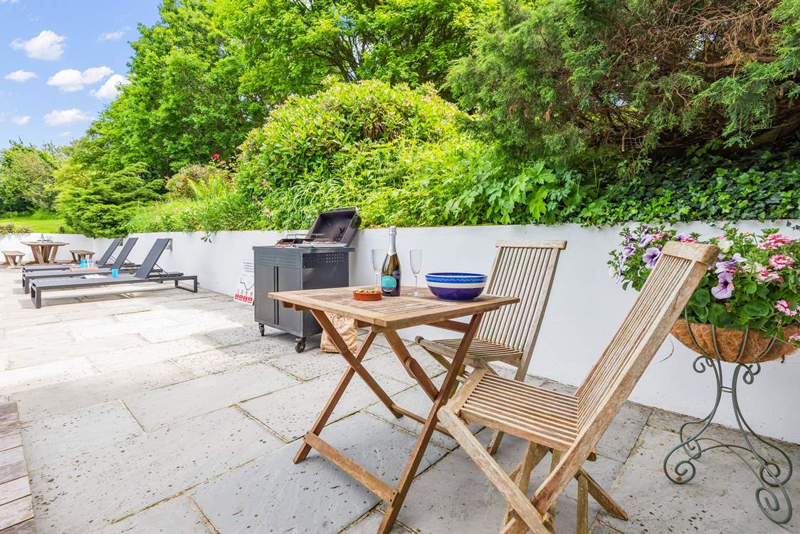 Spark up the barbecue whilst the water lovers enjoy the heated pool.