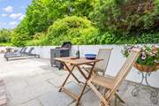Spark up the barbecue whilst the water lovers enjoy the heated pool.