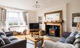 Cosy up in this delightful sitting-room. - Thumbnail Image