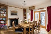 Share a meal in the bright and airy dining-room.