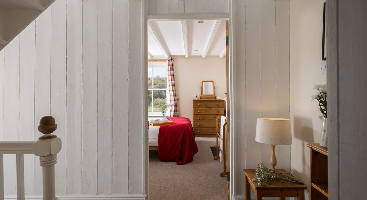 Admire the original beams and panelling.