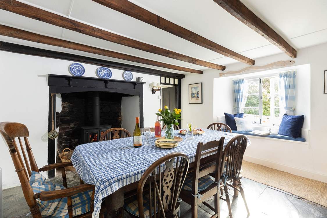 This dining-room is certainly the heart of this house and will host the perfect family feast as the fire crackles.