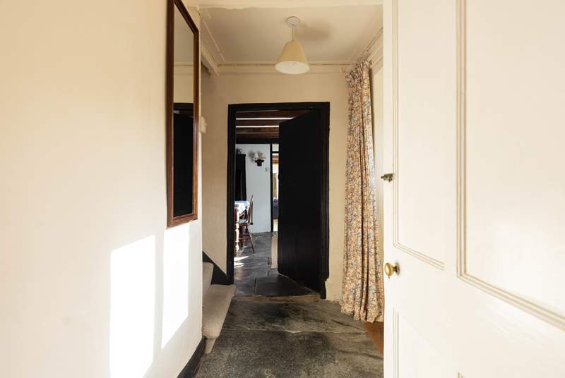 Downstairs is linked by a corridor with those grand old slate floors, many a visitor has been and gone! 