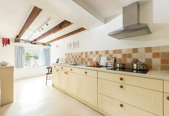 The kitchen sits centrally in this old farmhouse but has been fully modernised creating the perfect spot to cook up a family feast!