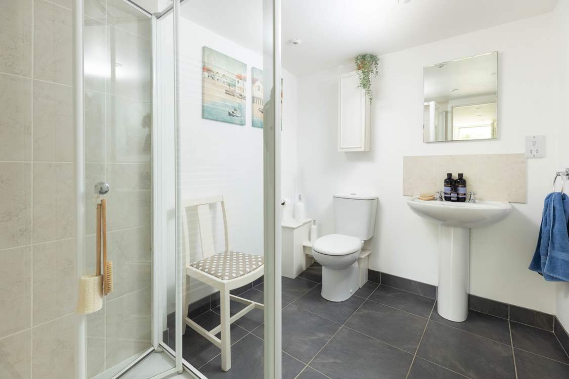 The downstairs shower-room sits off the utility and is perfect for washing those sandy toes after a day at the beach.