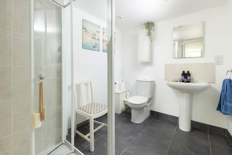 The downstairs shower-room sits off the utility and is perfect for washing those sandy toes after a day at the beach. 