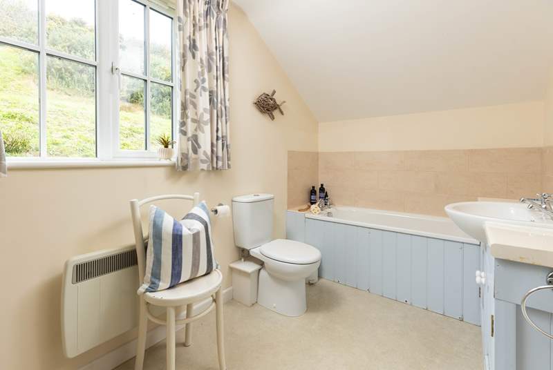 The second bathroom sits between bedroom three and four, again off of a split-landing. This modern extension has allowed the owners to install bathrooms that offer both shower cubicles and a bath!