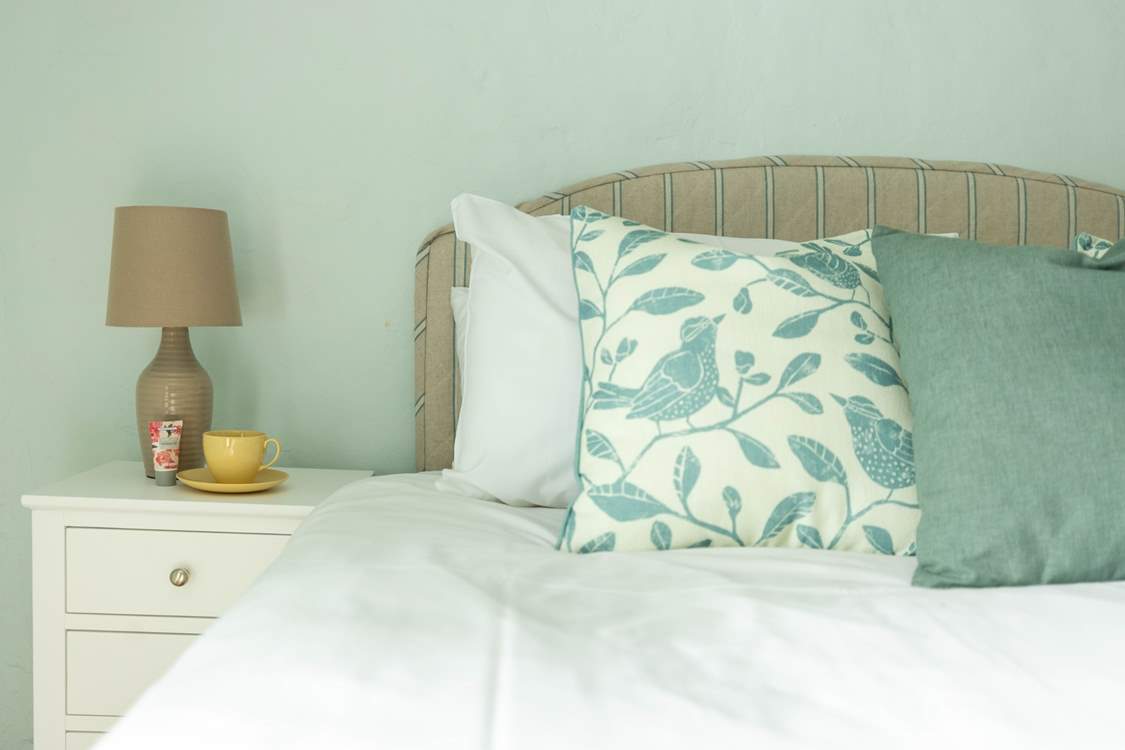 Head through to bedroom three, this peaceful bedroom benefits from views out towards the garden with a sense of calm thanks to those soft greens and muted tones. This room is the largest offering space for a cot should this be required.