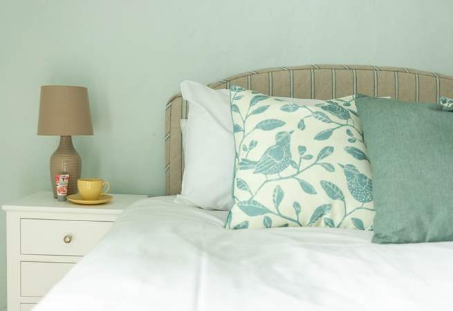 Head through to bedroom three, this peaceful bedroom benefits from views out towards the garden with a sense of calm thanks to those soft greens and muted tones. This room is the largest offering space for a cot should this be required.