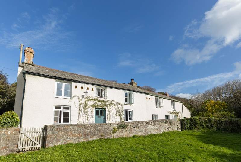 The perfect rural retreat surrounded by rolling fields and grazing stock, with a beach a short stroll away. 