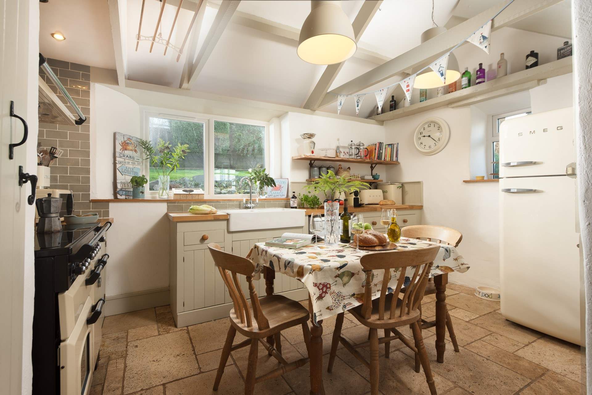 Beautifully high ceilings in this pretty farm house kitchen. 