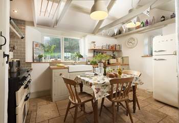 Beautifully high ceilings in this pretty farm house kitchen. 