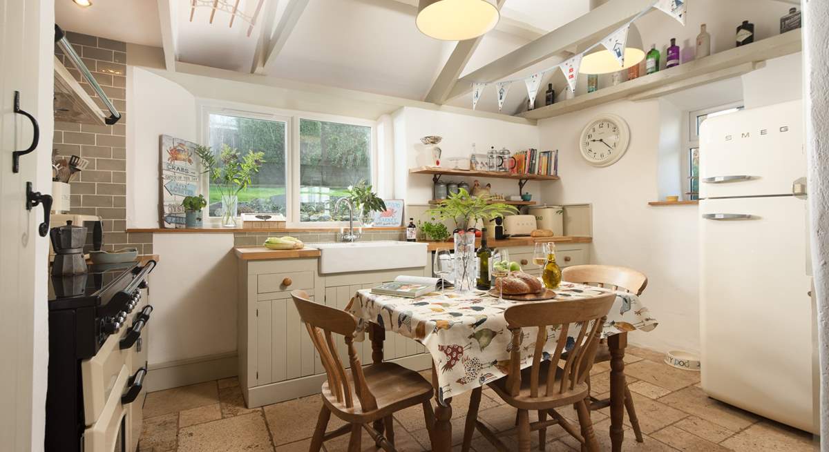 Beautifully high ceilings in this pretty farm house kitchen. 