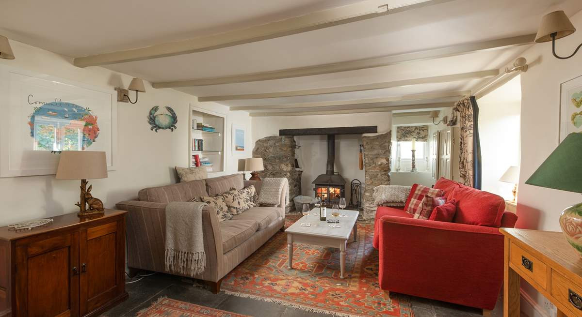 The cosy sitting-room with a toasty wood-burner. 