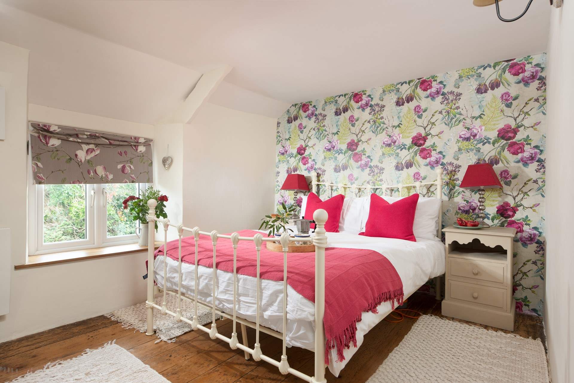 The main bedroom has a king-size bed and is located on the first floor. 