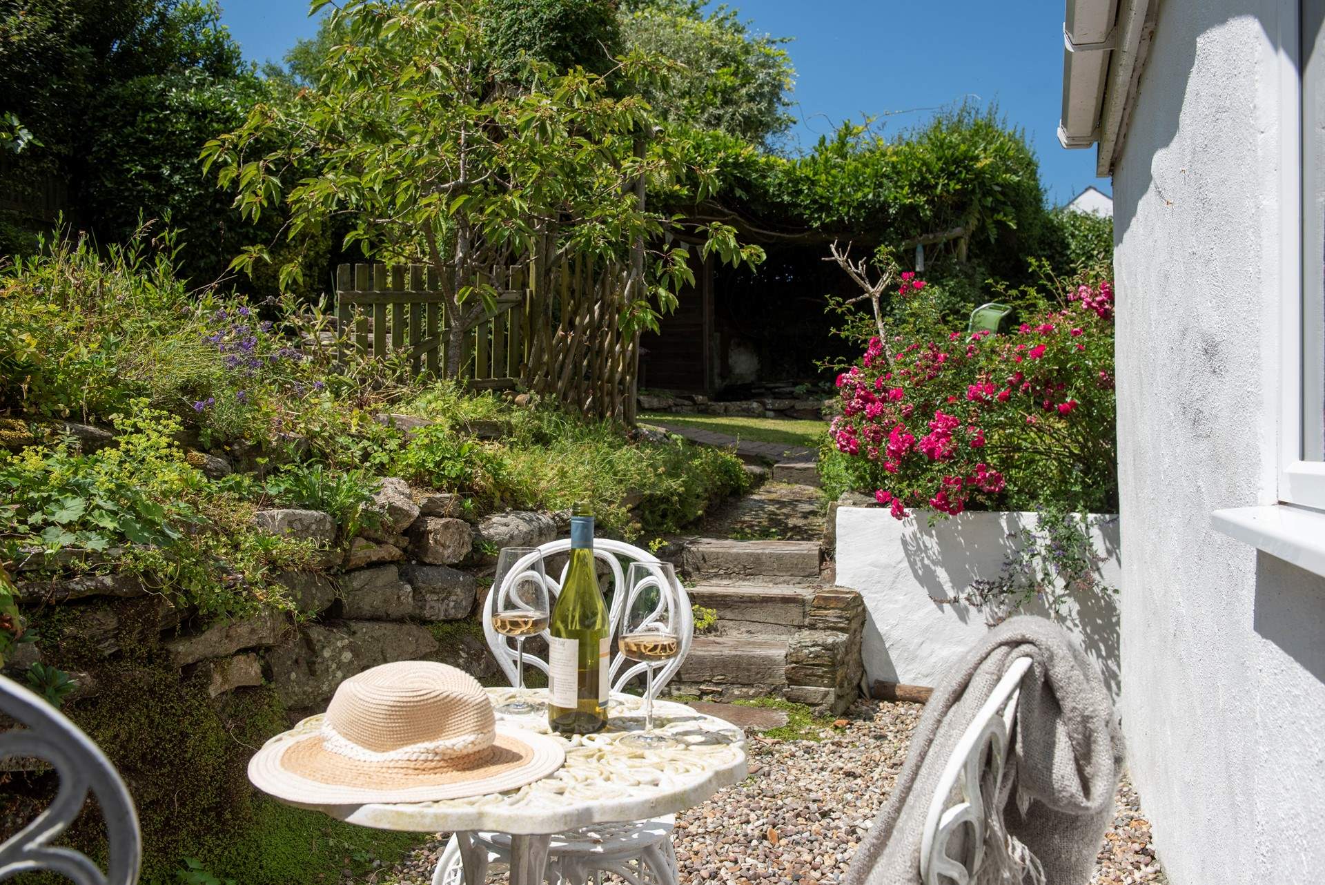 Looking to the garden from another tucked away seating area just outside the ground floor bedroom.