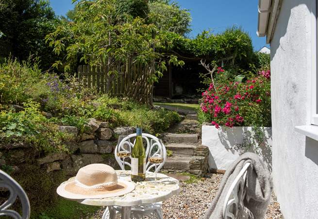 Looking to the garden from another tucked away seating area just outside the ground floor bedroom.