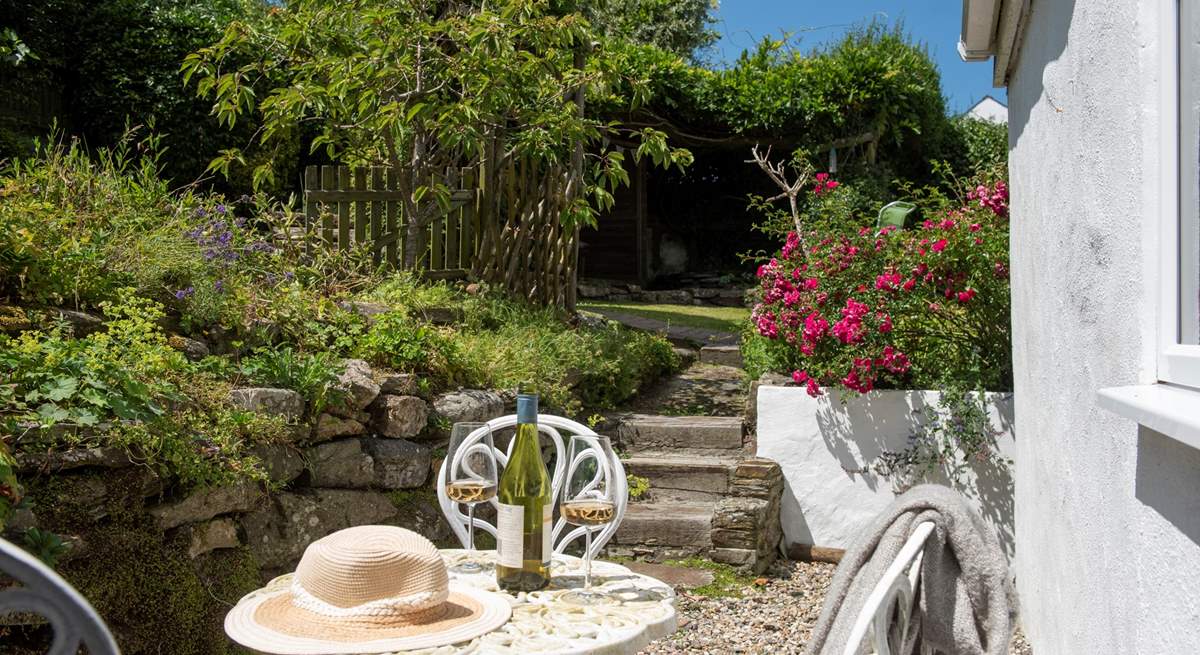 Looking to the garden from another tucked away seating area just outside the ground floor bedroom.