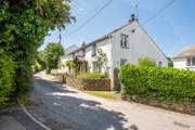 The cottage is tucked away on a quiet lane.