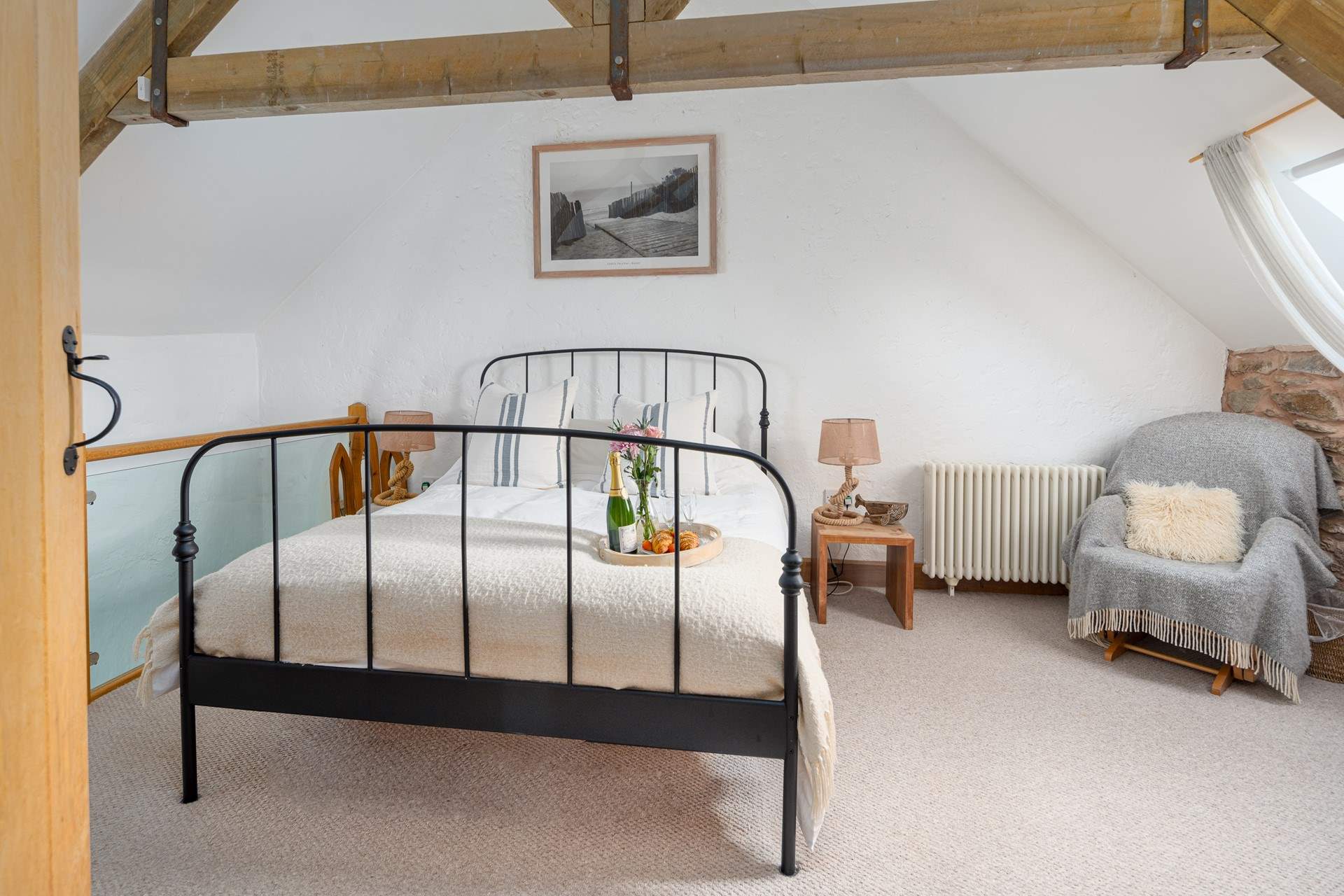 From the delightful en suite king room gaze across the meadows and craggy outcrops towards the dramatic coastline.