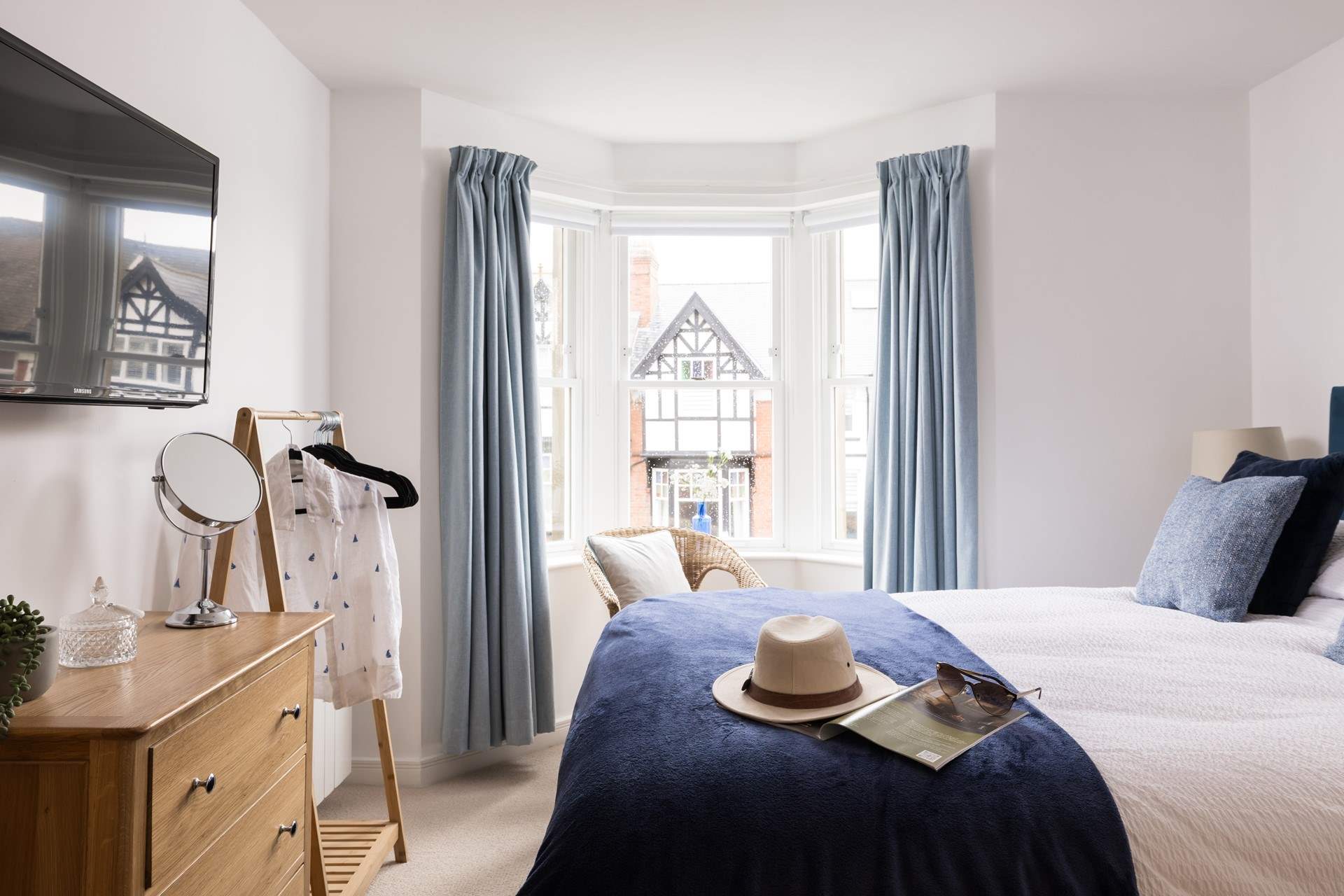 Relax and recline in this pretty bedroom.