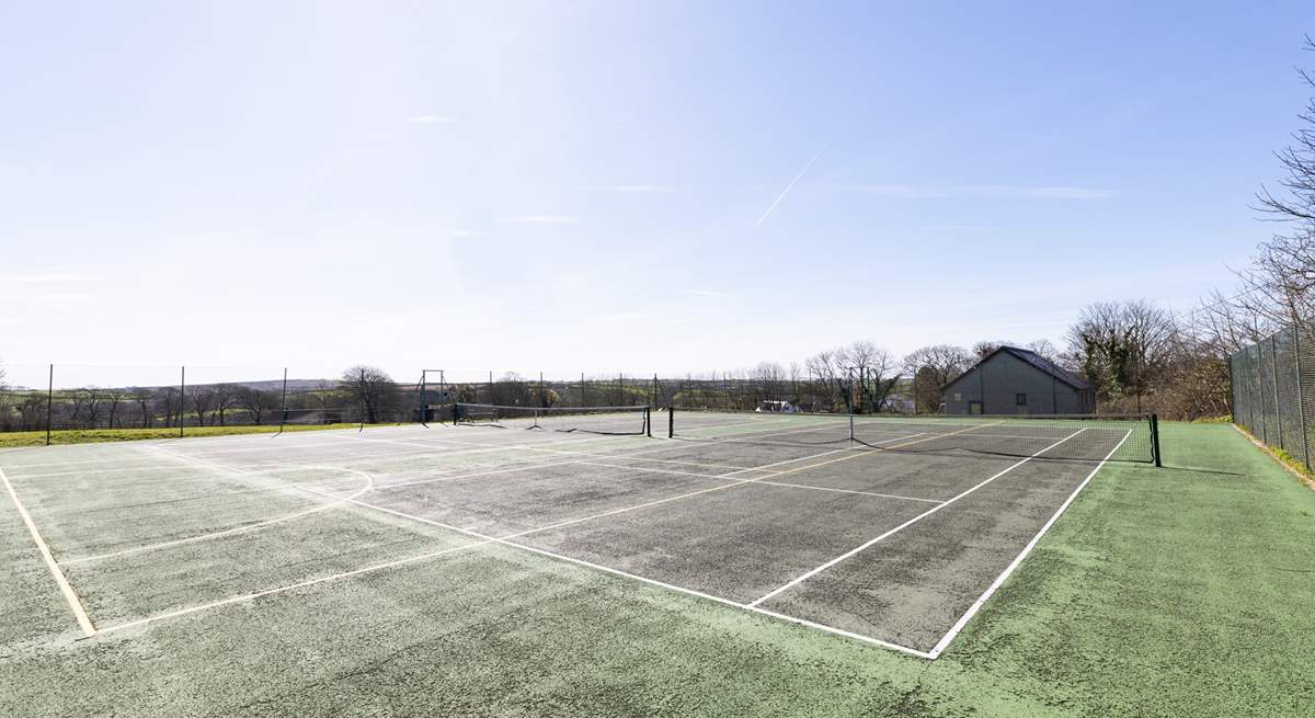 The tennis courts at Manaccan have an honesty box for your use. There is also a playing field and park here, with free parking.