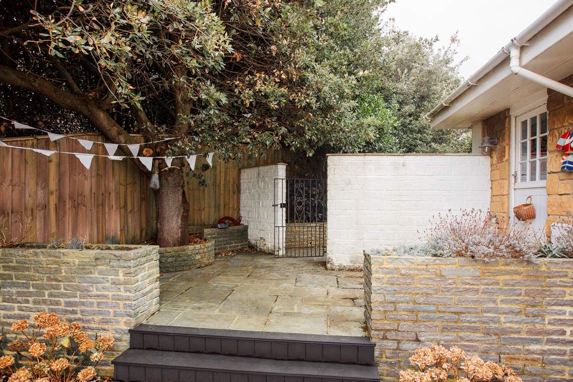 The side gate to the property  and door leading in to the kitchen.