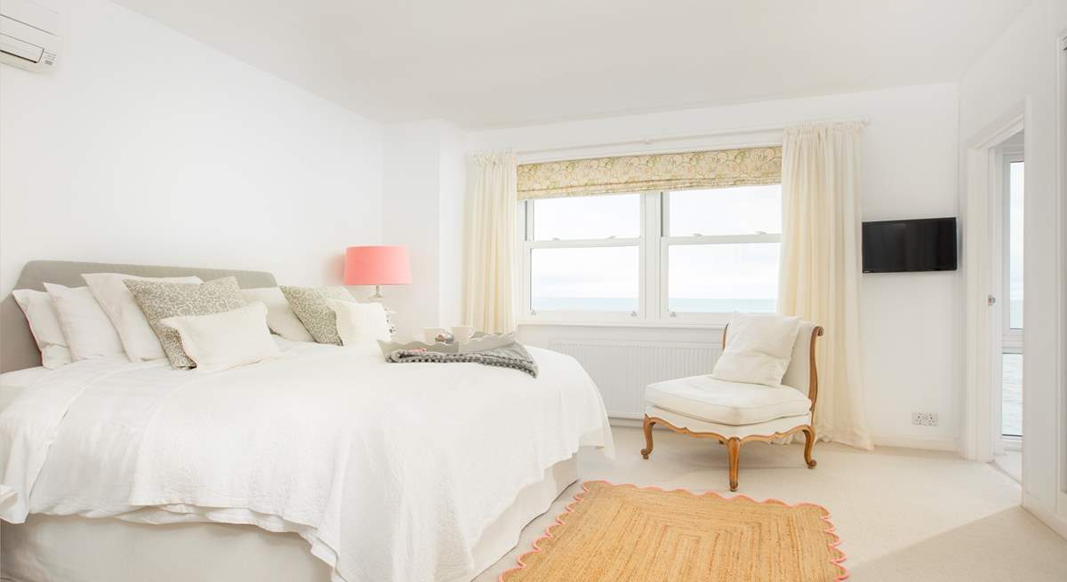 The main bedroom with super-king double bed and gorgeous sea views.