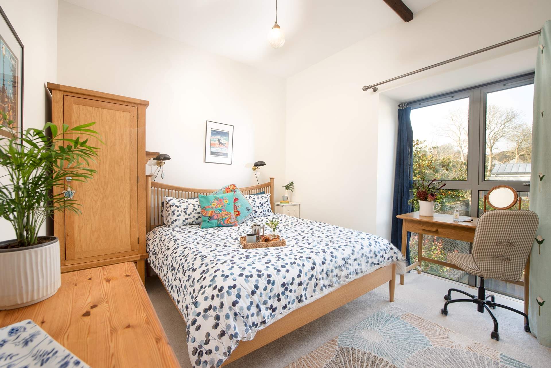 The large window really lets the light flood into bedroom one.