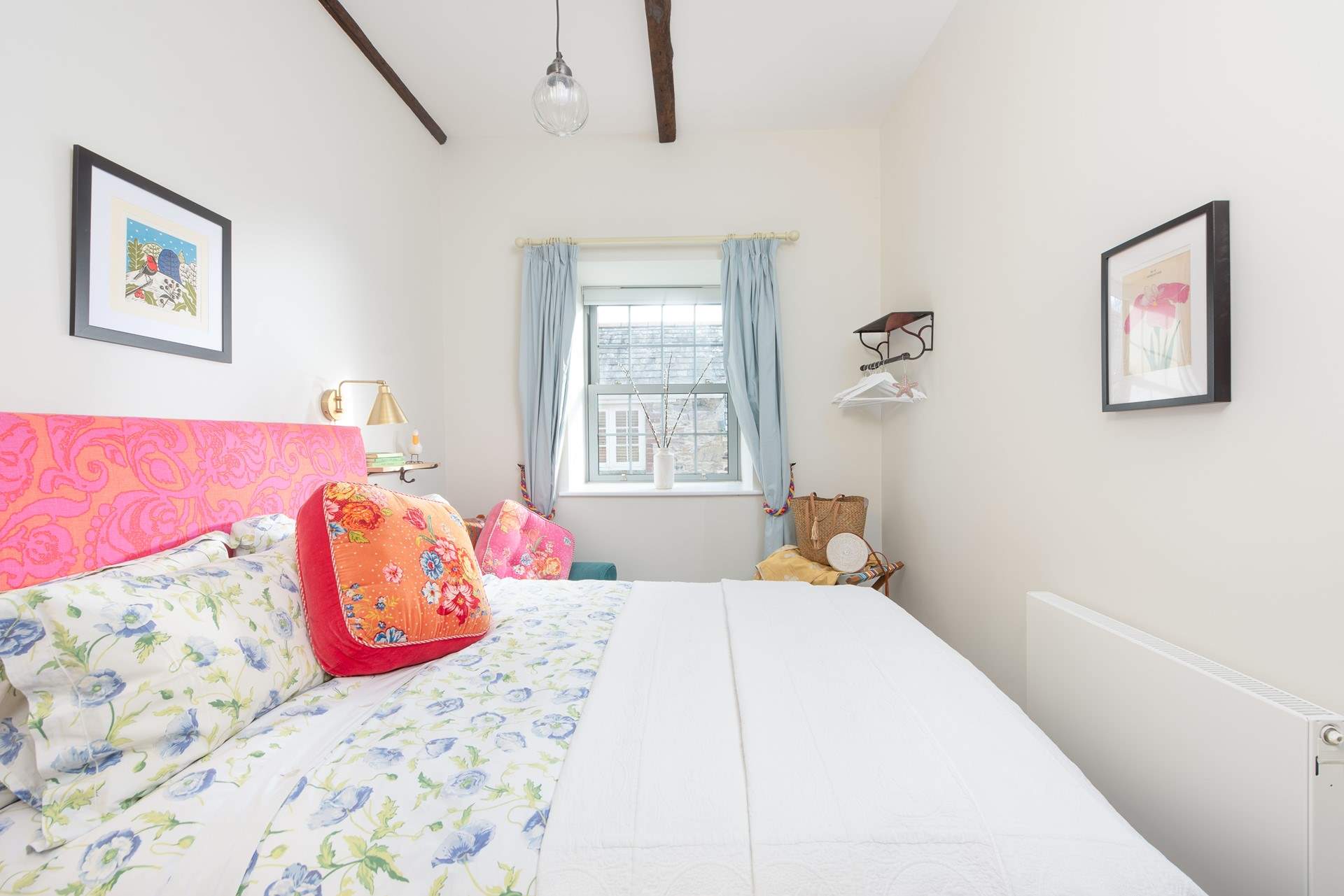 A king bed awaits in bedroom two.