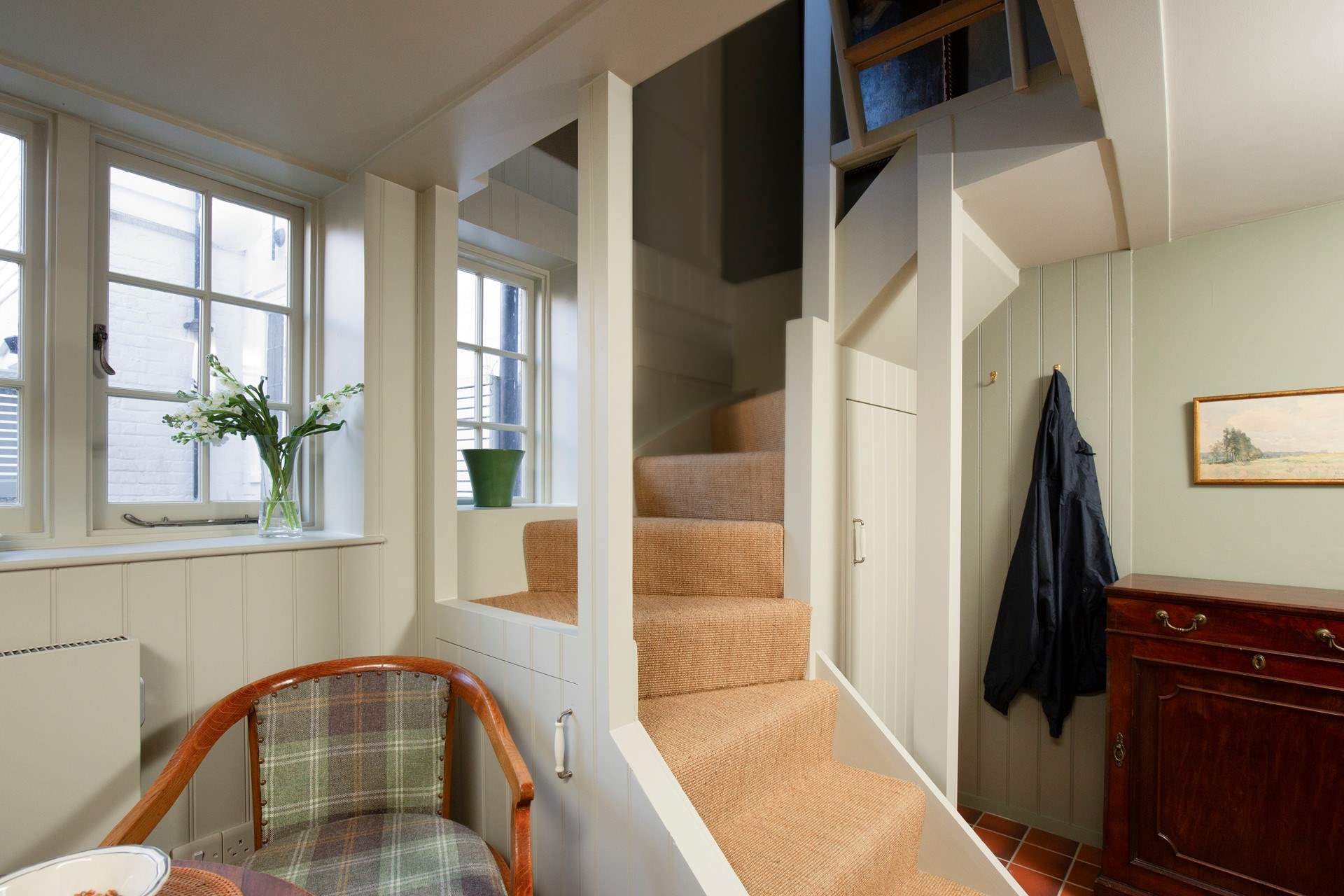 Stairs lead to the first floor.