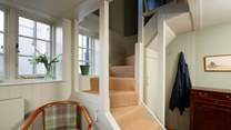Stairs lead to the first floor.