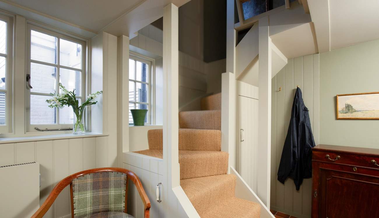 Stairs lead to the first floor.