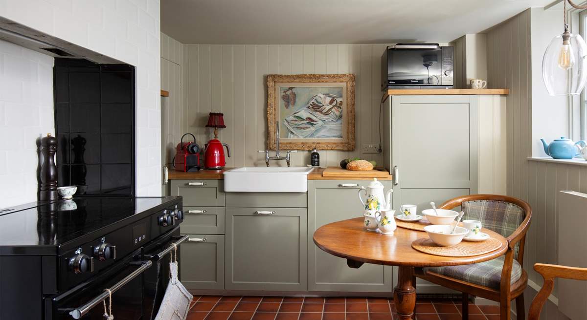 The kitchen is compact but equipped with everything you need to whip up a holiday feast.