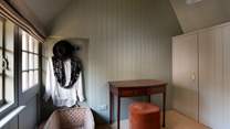 There is a large wardrobe and plenty of space to hang clothes.