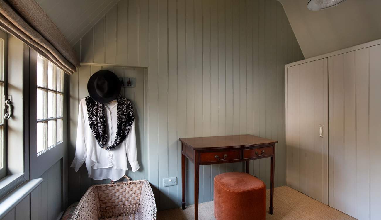 There is a large wardrobe and plenty of space to hang clothes.