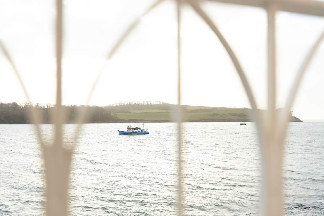 Watch the boats sail past.