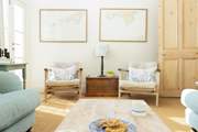 Coastal furnishings are the perfect fit for the location.