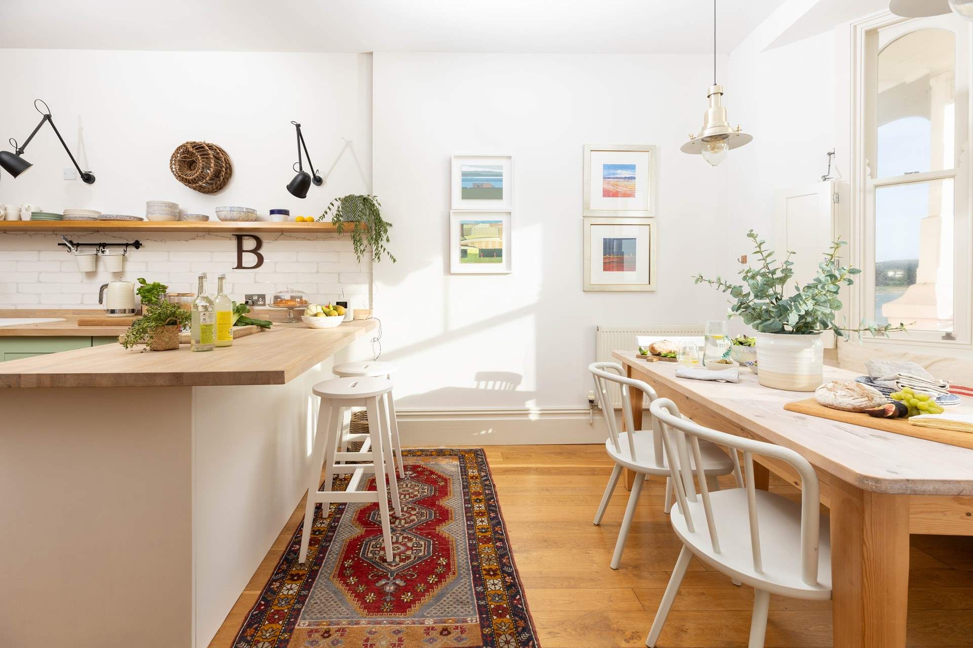 The kitchen/dining-room is beautifully styled. 
