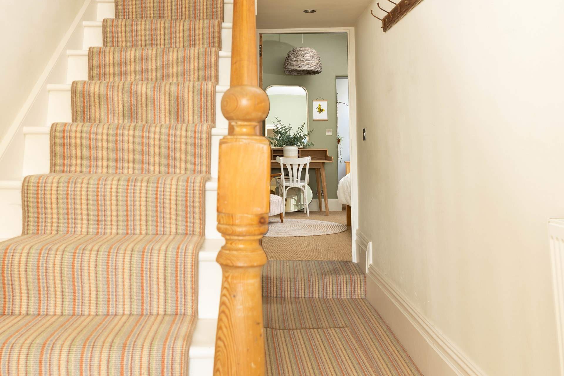 The stairs from the ground floor. 