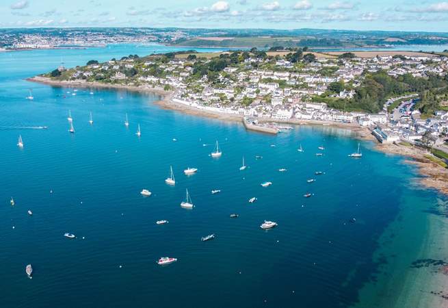 A bird's eye view of St Mawes with Falmouth in the background.