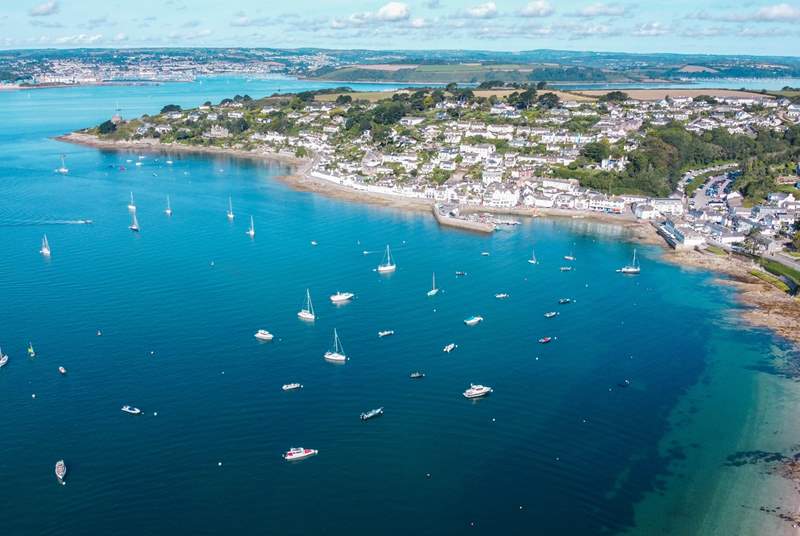A bird's eye view of St Mawes with Falmouth in the background.