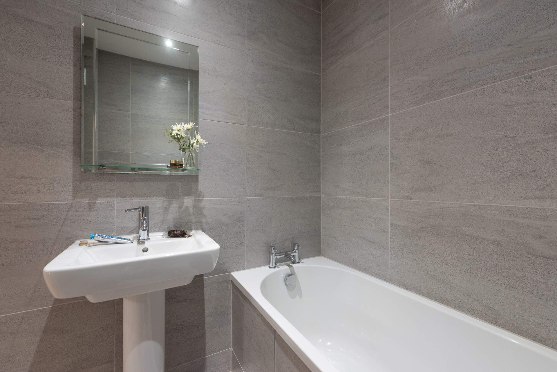 The family bathroom is situated next to bedroom 1.