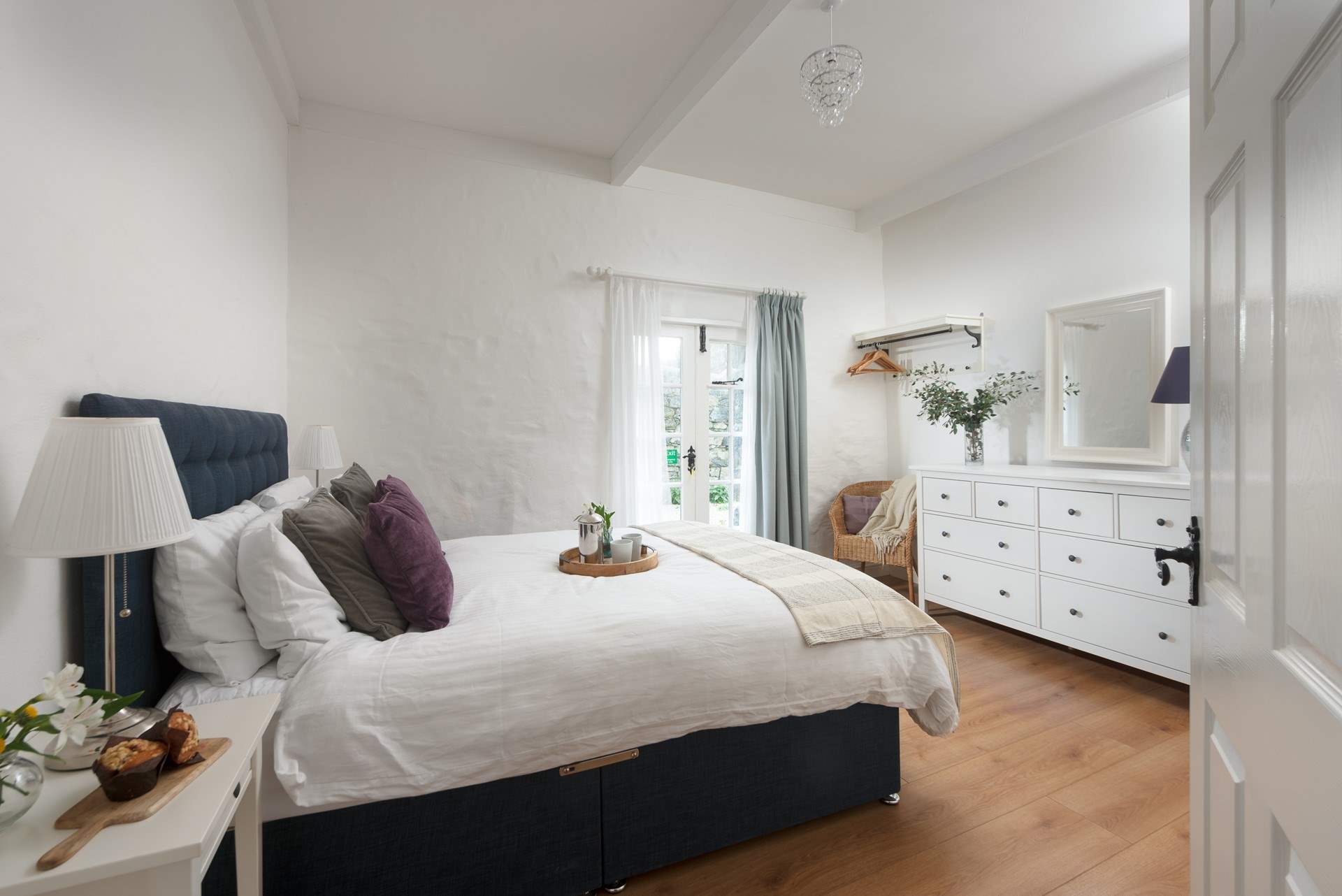 The king bedroom is really spacious with beautiful beams.