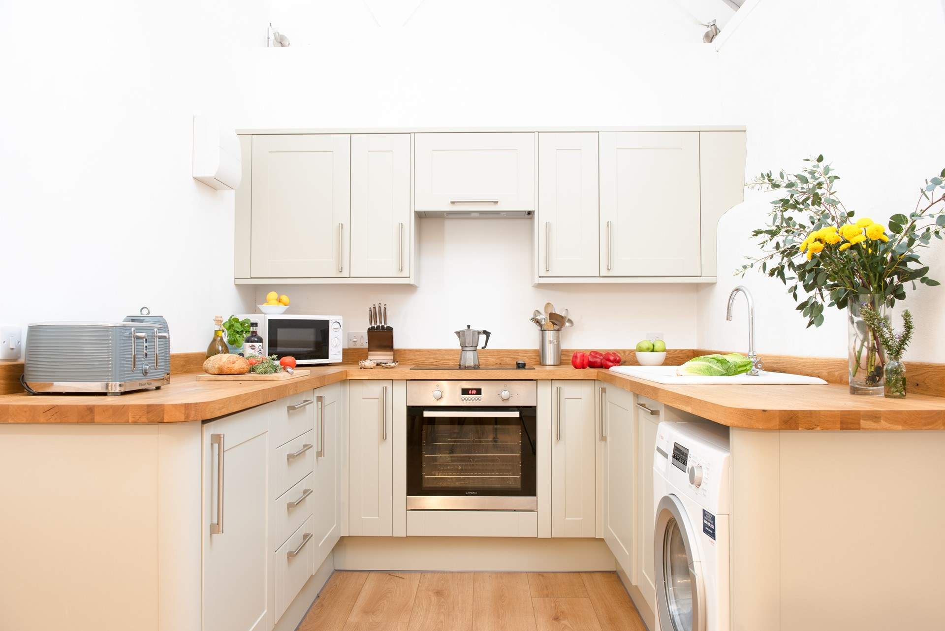 The kitchen space is well-equipped.