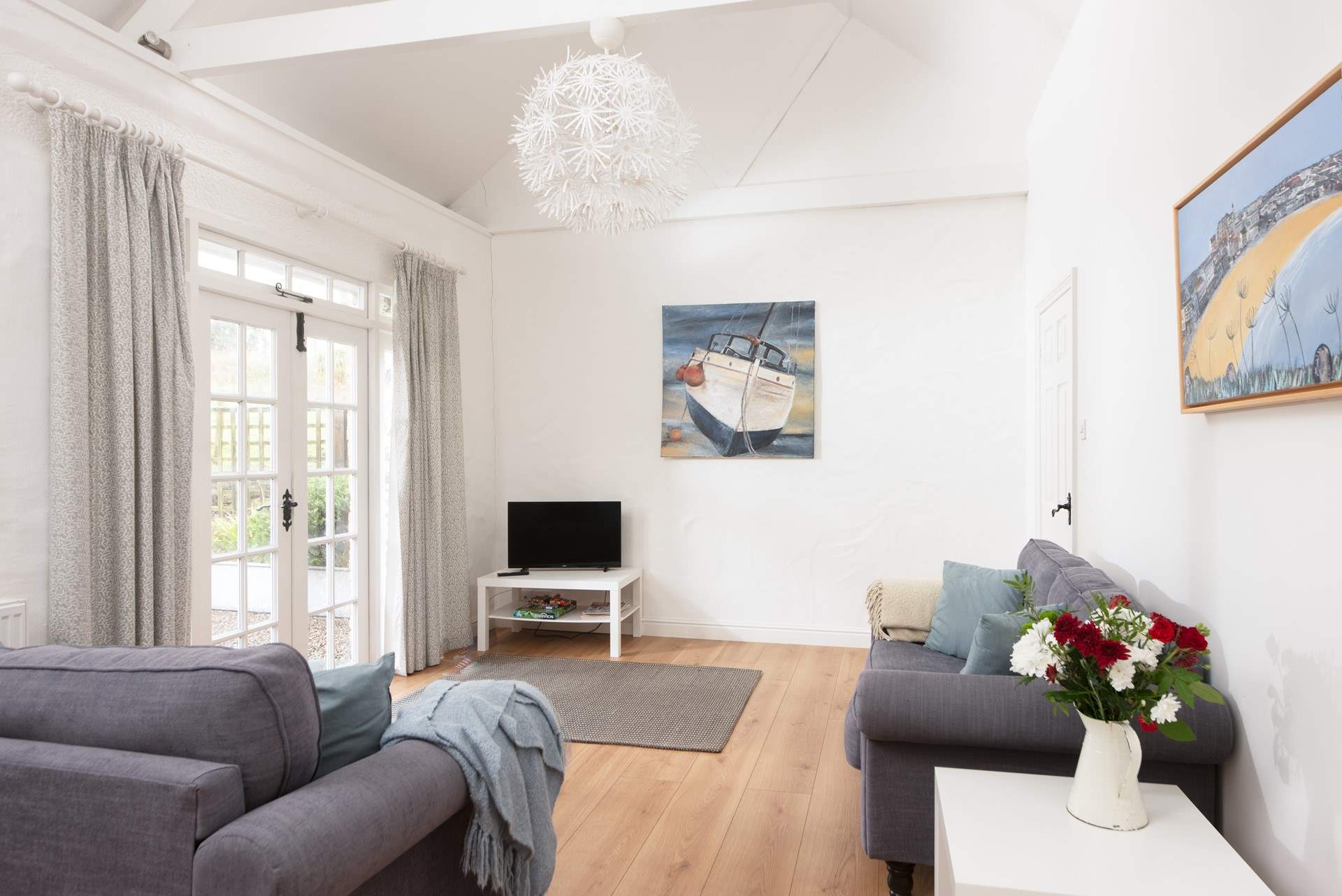 Featuring beautiful vaulted ceilings, soft furnishings and double doors that lead on to the patio-area.