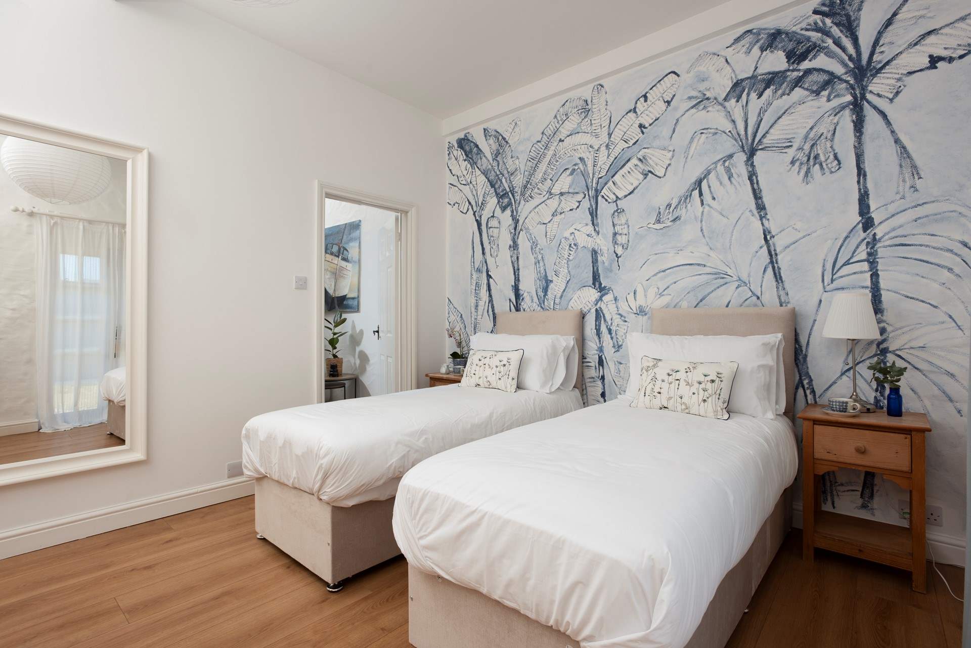 Bedroom 2 is a king-size double or twin, and has its own stunning mural.