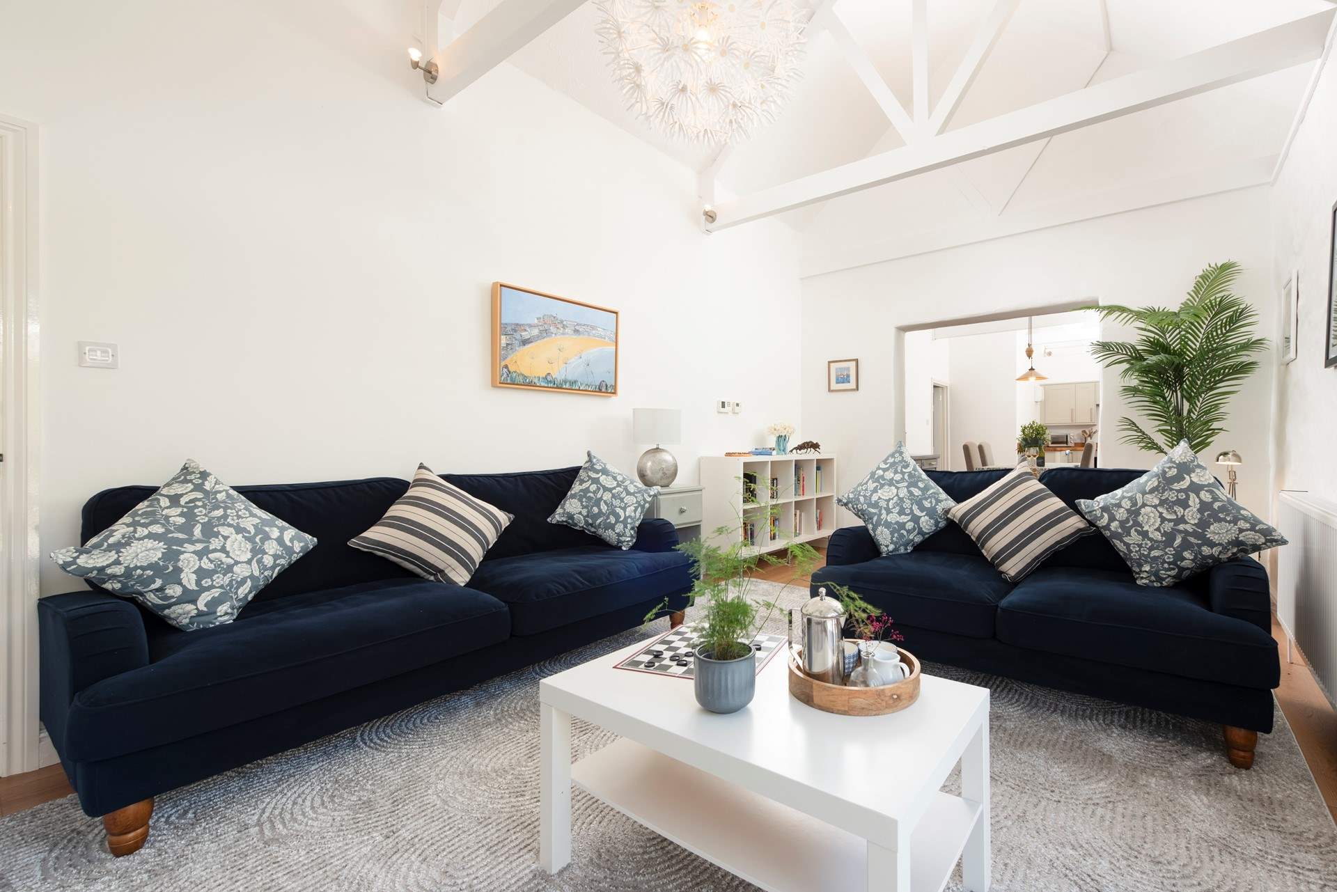 The gorgeous sitting room has games and books.