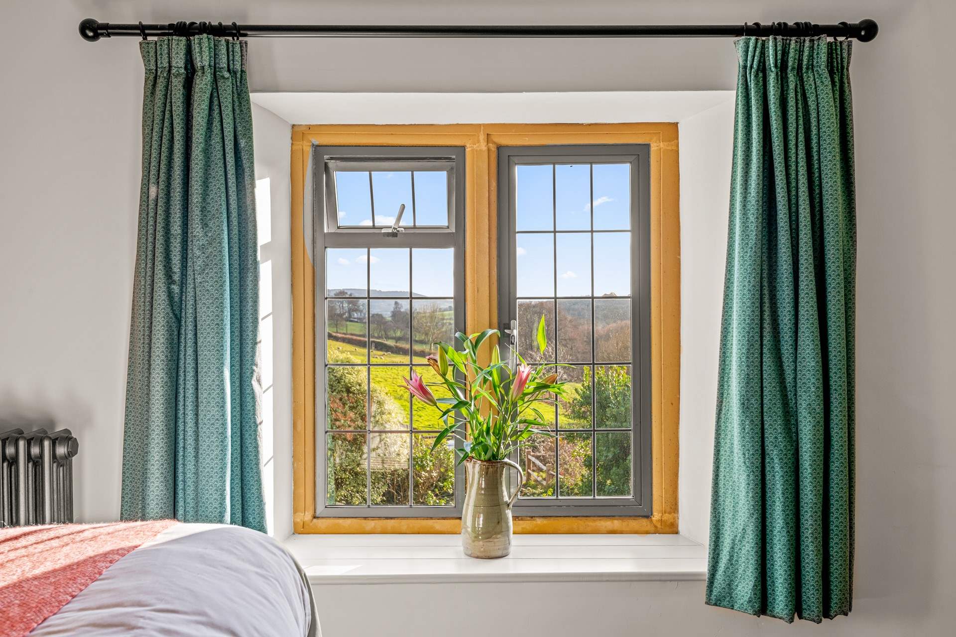 What a view to enjoy through the bubbles from the roll-top tub.