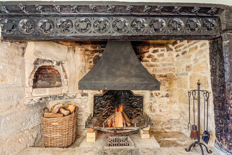 The fireplace is steeped in history. The charm of this beautiful house oozes through every room.